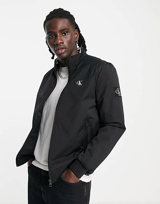 Calvin Klein Jeans monogram badge padded harrington jacket in black | ASOS