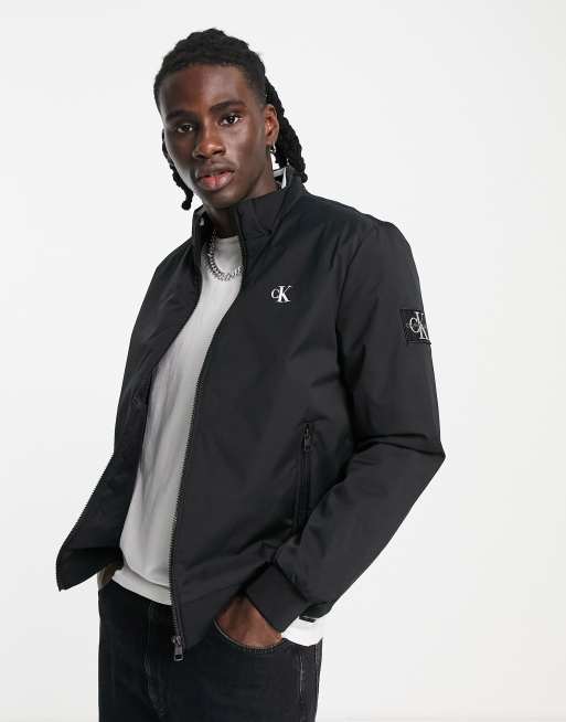 Calvin Klein Jeans monogram badge padded harrington jacket in black | ASOS