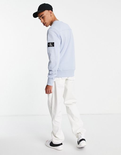 Calvin Klein Jeans monogram badge sweatshirt in light blue