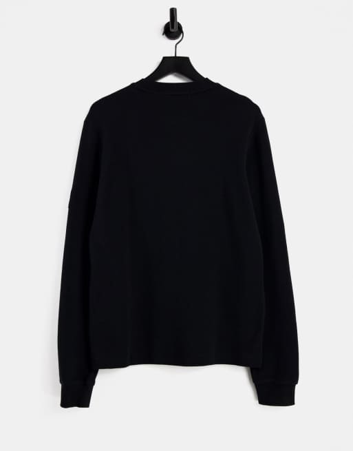 Calvin Klein Jeans monogram badge waffle long sleeve t-shirt in black