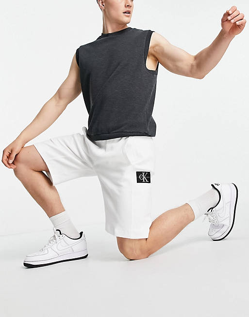 Calvin Klein Jeans monogram badge waffle shorts in white
