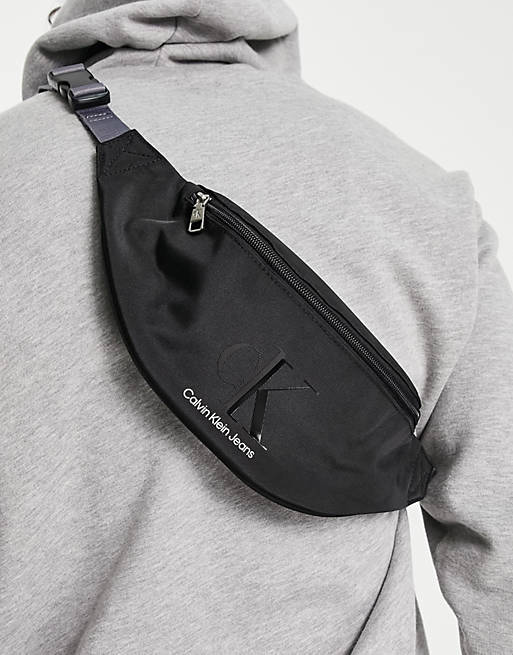 Calvin Klein Jeans monogram bum bag in black | ASOS