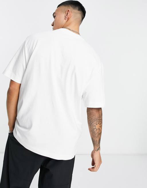 Calvin Klein text reverse chest logo T-shirt in black, ASOS