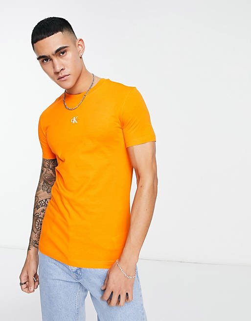 Calvin Klein Jeans monogram chest small logo T-shirt in orange | ASOS