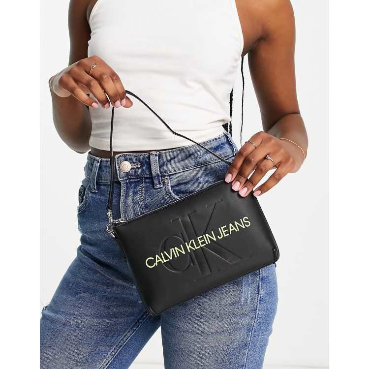 CALVIN KLEIN JEANS - Women's saddle shoulder bag with monogram