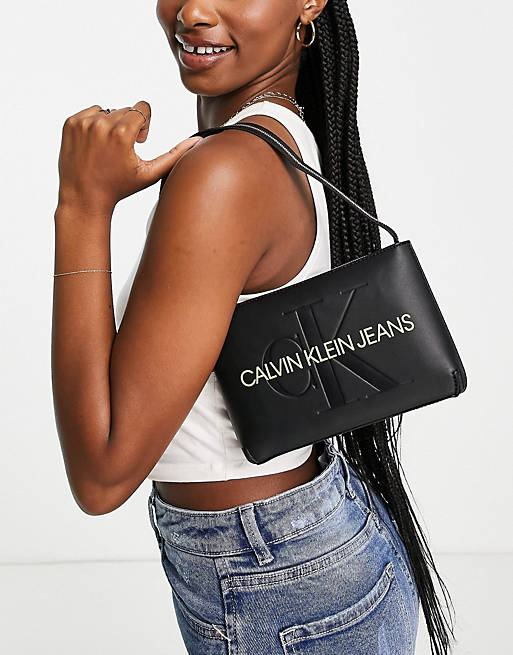 Calvin Klein Jeans monogram lime logo chain shoulder bag in black | ASOS