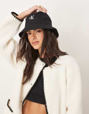 Calvin Klein Jeans monogram logo bucket hat in black | ASOS