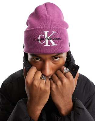 Calvin Klein Jeans monogram logo embroidered beanie in purple - ASOS Price Checker