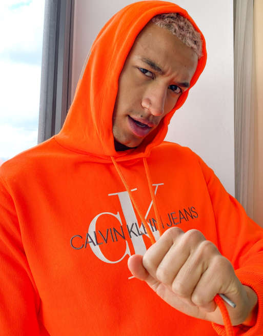 Orange calvin klein store hoodie