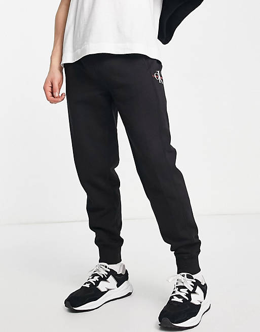 Calvin Klein Jeans monogram logo joggers in black | ASOS