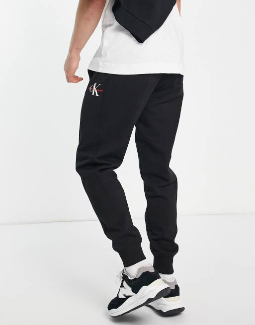 Calvin Klein Jeans monogram logo joggers in black