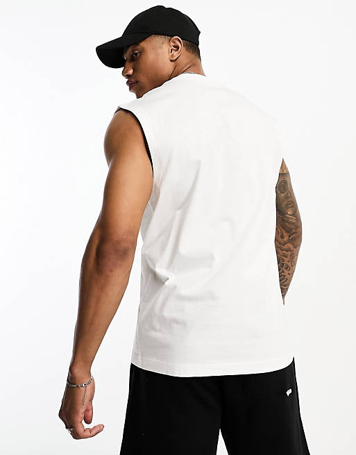 Calvin Klein Jeans monogram logo sleeveless vest in white | ASOS