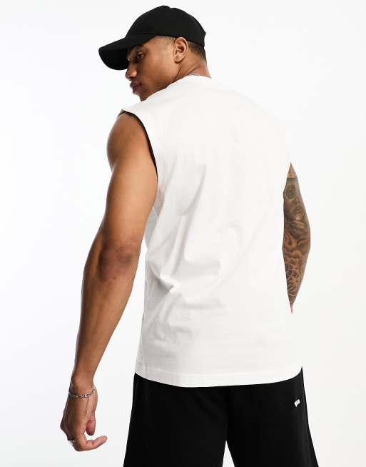 Calvin Klein Jeans monogram logo sleeveless vest in white | ASOS