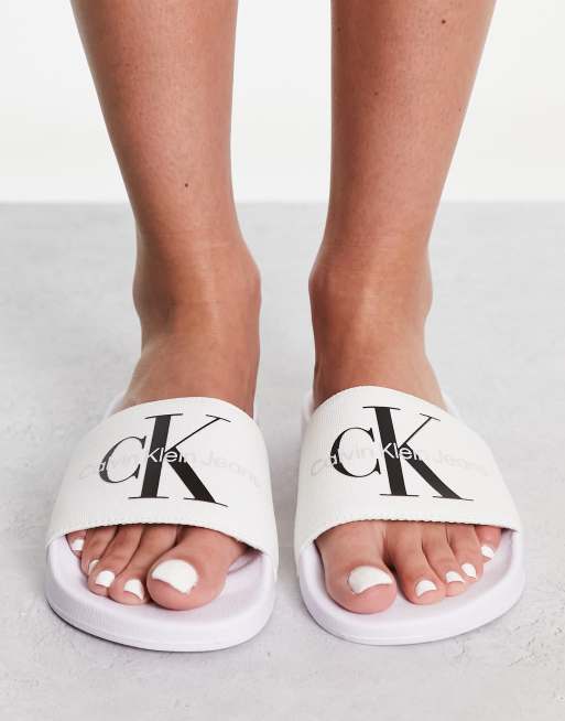 Womens white calvin hot sale klein sliders