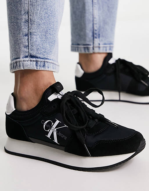 Calvin Klein Jeans monogram logo sneakers in black | ASOS