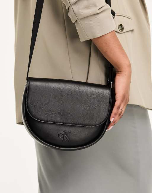 Calvin klein store slide saddle bag