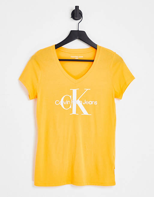 Calvin Klein Jeans monogram short sleeve t-shirt in orange | ASOS