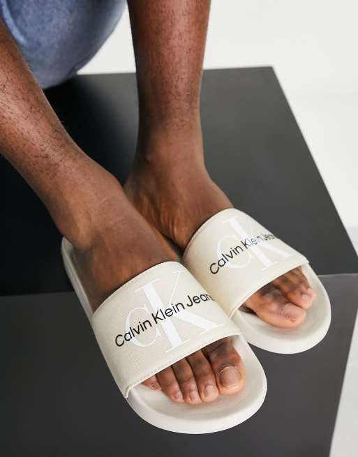 Calvin Klein Jeans monogram slides in ivory