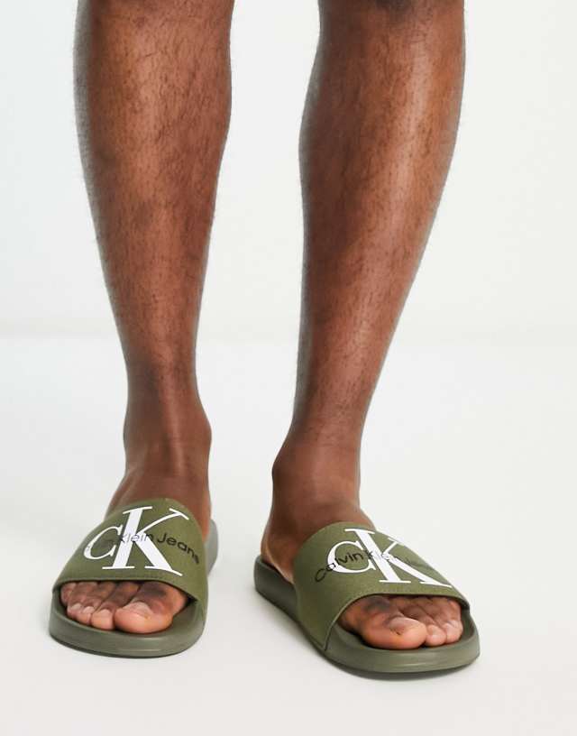 Calvin Klein Jeans monogram slides in olive