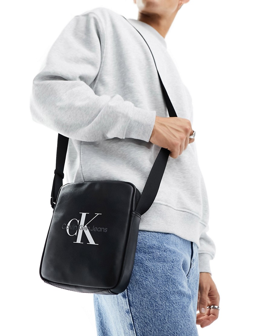 Calvin Klein Jeans monogram soft reporter bag in black