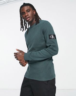 Calvin Klein Jeans monologo badge waffle long sleeve top in dark green