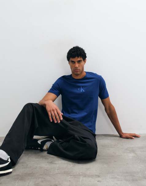 Calvin Klein Jeans monologo graphic t-shirt in blue - view 1