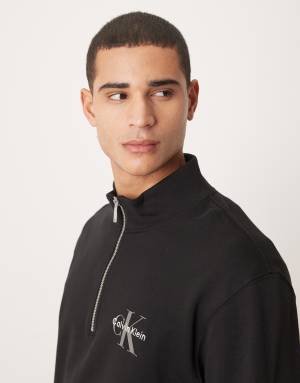 Calvin Klein Jeans Monologo quarter zip sweatshirt in black