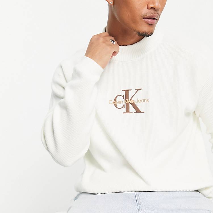 Calvin Klein Jeans monologo relaxed fit high neck knit sweater in ivory |  ASOS