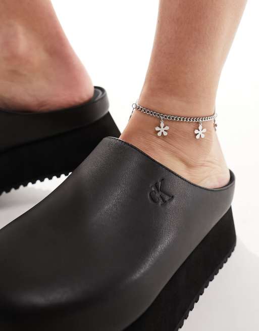 Calvin Klein Jeans Mules à semelle plateforme et bout fermé