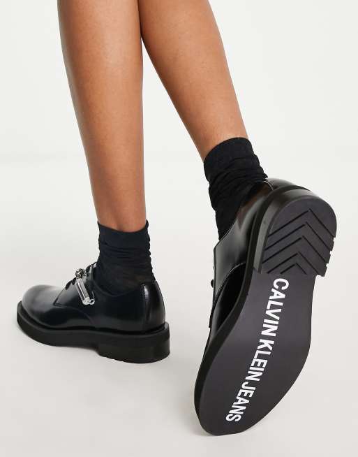 Calvin klein shop black flat shoes