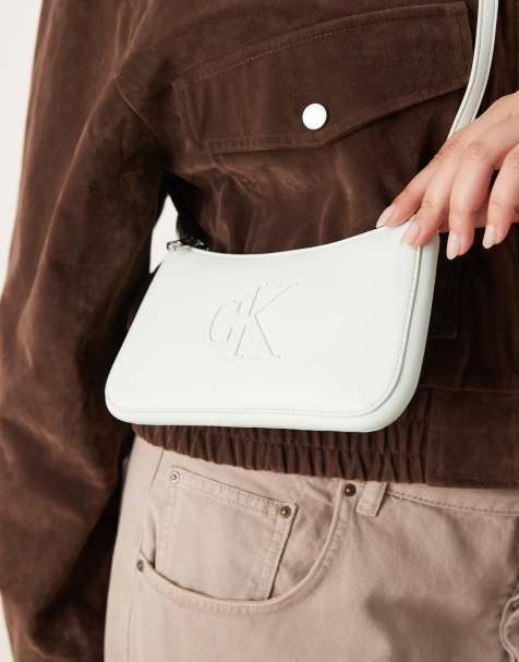 Calvin Klein Jeans – Niebieska mała torebka na ramię z dużym logo - view 1