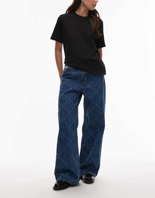 Calvin Klein Jeans – Niebieskie jeansy baggy z niskim stanem z wycinanym laserowo wzorem z logo