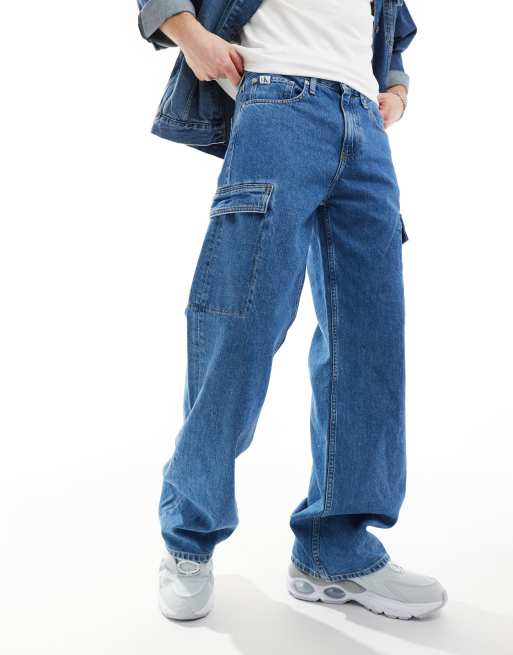 Calvin Klein Jeans – Niebieskie jeansy bojówki o luźnym kroju w stylu lat 90.