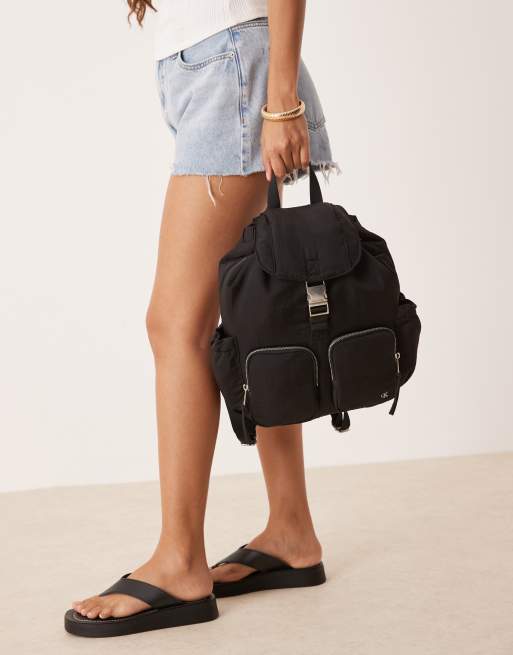 Calvin Klein Jeans nylon pocket backpack in black | ASOS