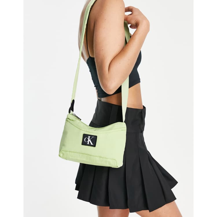 Buy Calvin Klein Top Zip Closure Enfold Cross Body Bag Green In Green