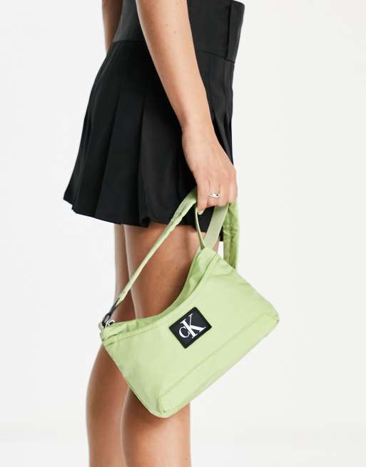 Buy Calvin Klein Top Zip Closure Enfold Cross Body Bag Green In Green