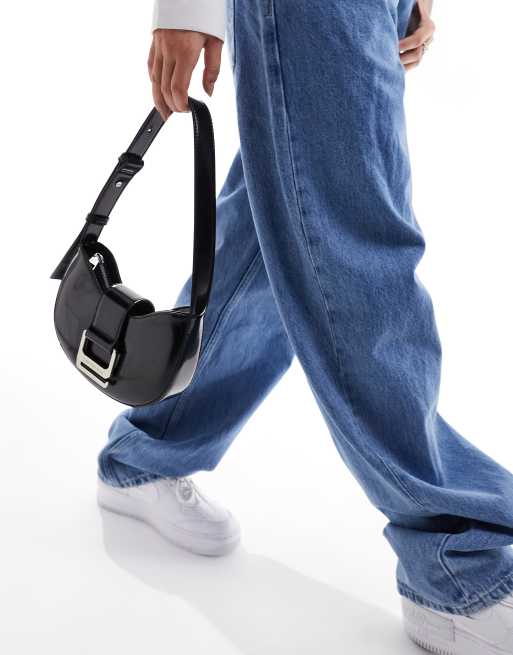 Calvin Klein Jeans off duty round shoulder bag in black | ASOS