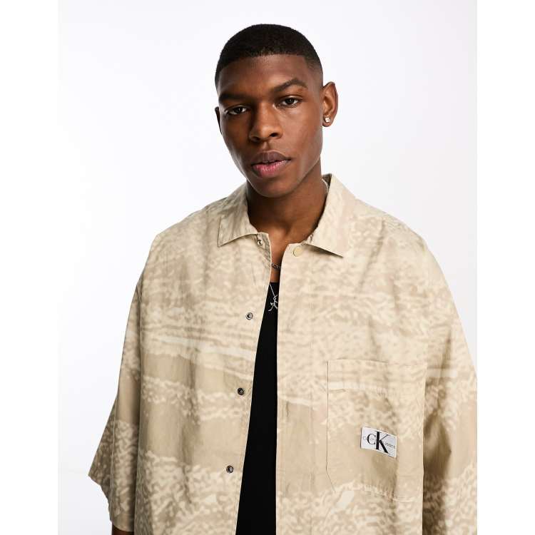 Calvin Klein Jeans oversized graphic short sleeve shirt in beige | ASOS