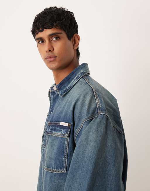 Calvin Klein Jeans – Oversize–Jeansjacke in blauer Stone-Waschung, 4 von 5