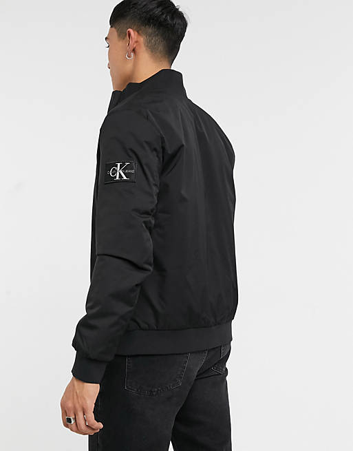 Calvin Klein Jeans padded harrington jacket in black | ASOS