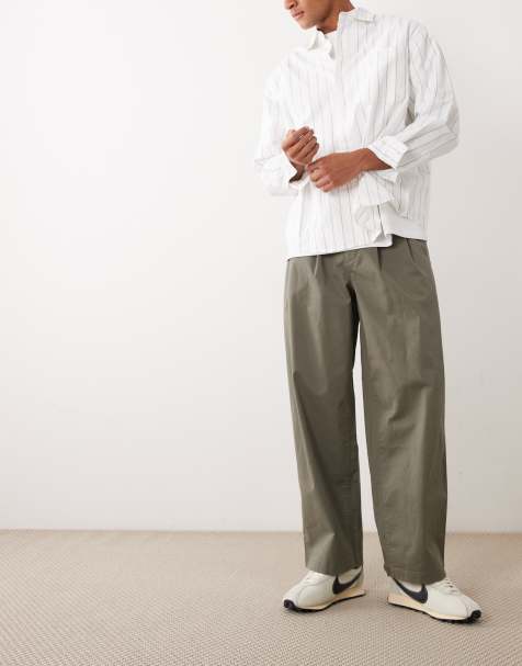 Calvin Klein Jeans - Pantalon en coton avec plis sur le devant - Olive - view 1