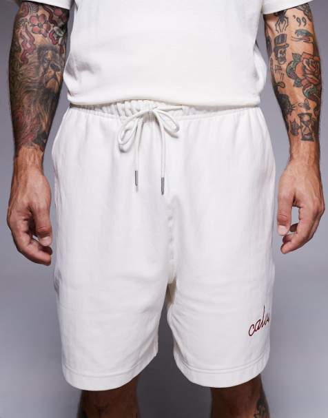 Calvin Klein Jeans - Pantaloncini premium color panna con logo cucito - view 1