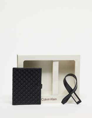 Calvin Klein Jeans passport & luggage tag gift set in black | ASOS