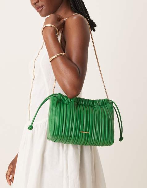Calvin Klein Jeans plisse cross body bag in green and gold - view 1
