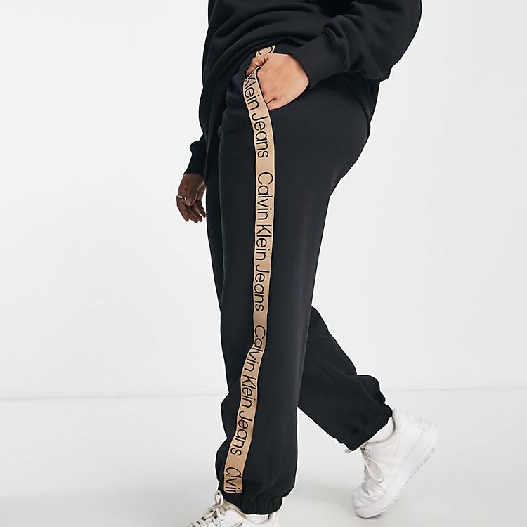 Calvin Klein Jeans Plus logo tape joggers in black | ASOS