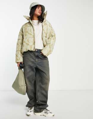 Calvin Klein Jeans polyester all over logo oversized puffer jacket in cream - CREAM - ASOS Price Checker