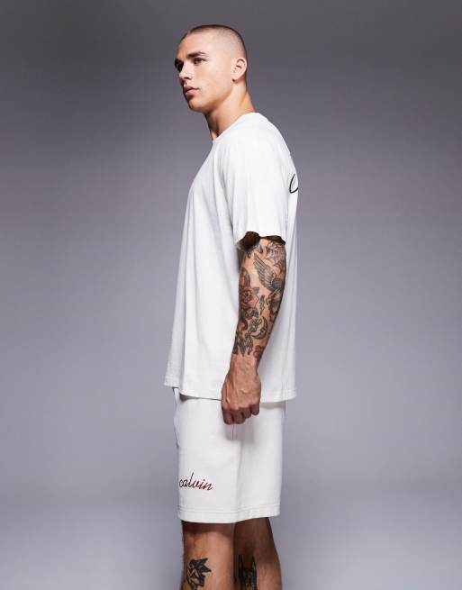 Calvin Klein Jeans premium stitch logo shorts in cream, 3 of 5