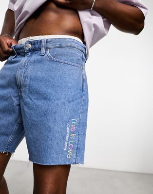 Calvin Klein Jeans Pride mid thigh denim shorts in light wash blue