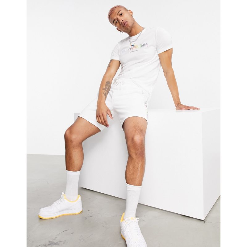 HPnM1 Designer Calvin Klein Jeans - Pride - Pantaloncini bianchi con logo arcobaleno laterale