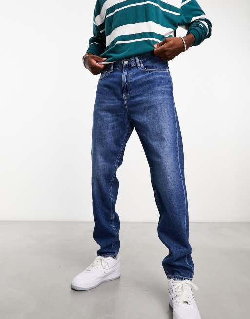 Calvin Klein Jeans regular tapered jeans in mid wash ASOS